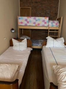 Ένα ή περισσότερα κρεβάτια σε δωμάτιο στο Marine's Guest House