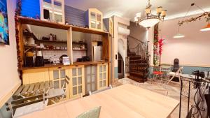 Кухня или мини-кухня в The House Company
