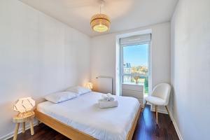 Кровать или кровати в номере Astrolabe - 2 bedrooms - Cozy and new - Balcony