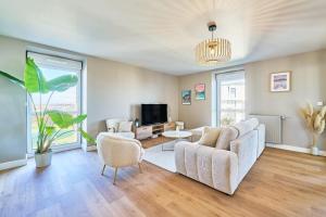 Телевизор и/или развлекательный центр в Astrolabe - 2 bedrooms - Cozy and new - Balcony