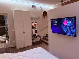 Μια τηλεόραση ή/και κέντρο ψυχαγωγίας στο Maison MoDì