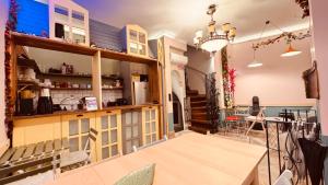 a kitchen and dining room with a table in a room at The House Company in Istanbul