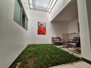 Κήπος έξω από το Sabana Studios