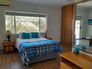 Ένα ή περισσότερα κρεβάτια σε δωμάτιο στο Opstêrs +5 φωτογραφίες