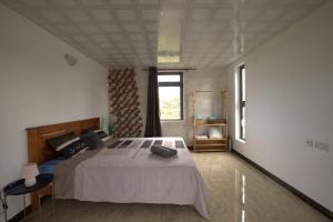 Ένα ή περισσότερα κρεβάτια σε δωμάτιο στο Serenity Cove - A Home Away From Home +46 φωτογραφίες