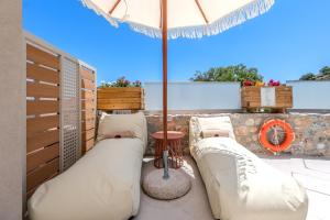 Χώρος καθιστικού στο Casa Karinea - Serene Stone House Retreat +67 φωτογραφίες