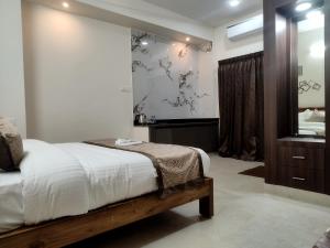 Una cama o camas en una habitación de Mount Bliss Stay