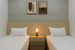 Ένα ή περισσότερα κρεβάτια σε δωμάτιο στο City Pause Hostel +32 φωτογραφίες