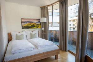 Postel nebo postele na pokoji v ubytování Hornweg Suites