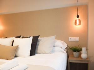 Postel nebo postele na pokoji v ubytování TAYP Navalmoral