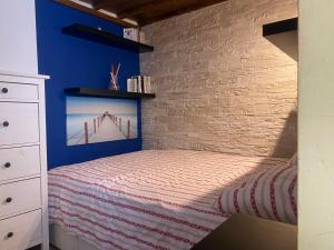 Ένα ή περισσότερα κρεβάτια σε δωμάτιο στο CASA GIOVANNI