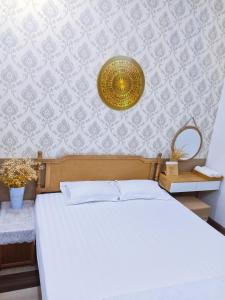 Postel nebo postele na pokoji v ubytování Hoàng Nga 2 Homestay