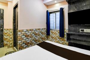 Ένα ή περισσότερα κρεβάτια σε δωμάτιο στο Hotel O Sana +21 φωτογραφίες