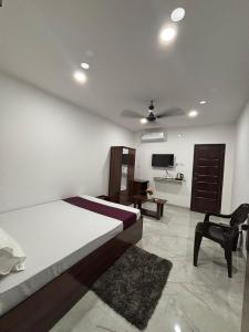 Μια τηλεόραση ή/και κέντρο ψυχαγωγίας στο Hoppin Homestay +2 φωτογραφίες