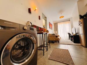 Η κουζίνα ή μικρή κουζίνα στο Harlem Suites