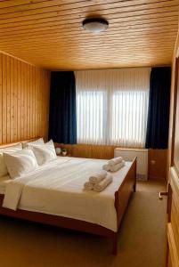 Ένα ή περισσότερα κρεβάτια σε δωμάτιο στο Frenkhausener Ruhepol