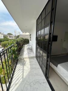 a balcony with a view of a building at Le MARIE B&B in Cartagena de Indias