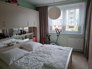 Postel nebo postele na pokoji v ubytování Casa Rosie