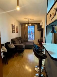 Et opholdsområde på Apartamento inteiro 43 mts em Hotel Famoso de Rede em Todo Brasil