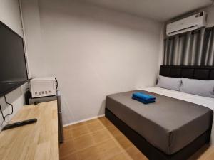 Μια τηλεόραση ή/και κέντρο ψυχαγωγίας στο D45 Home - BTS Ratchathewi N1 Station