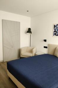 Una cama o camas en una habitación de Casa das Amendoeiras 18 fotos más