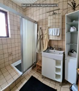 Ένα μπάνιο στο Appartement Schuller