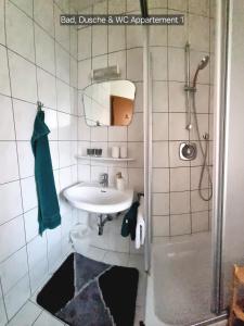 Ένα μπάνιο στο Appartement Schuller