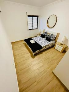 En eller flere senge i et værelse på Flat 5 Stars Praia da Rocha Portimão