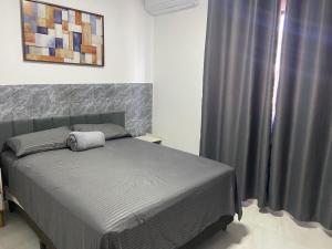 En eller flere senge i et værelse på Apartamento em Conde - Praia de Jacumã e Carapibus + 10 billeder