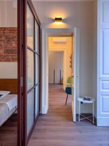 Ένα ή περισσότερα κρεβάτια σε δωμάτιο στο Casa Sarina Catania