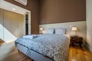 Ένα ή περισσότερα κρεβάτια σε δωμάτιο στο Orange Apartments A