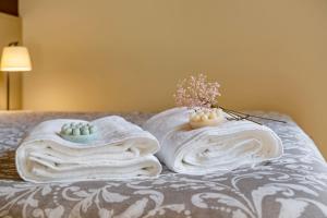 Ένα ή περισσότερα κρεβάτια σε δωμάτιο στο Orange Apartments A +25 φωτογραφίες