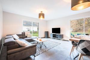 TV a/nebo společenská místnost v ubytování Maison proche station ski