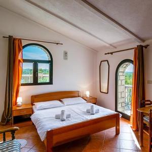 Giường trong phòng chung tại San Mauro