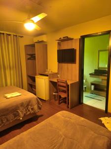 Η κουζίνα ή μικρή κουζίνα στο Pinheirais Pousada - Nova Prata +33 φωτογραφίες