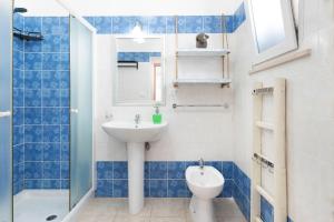 a bathroom with a sink and a toilet and a shower at B&B Antiche Stelle Salento in Salve