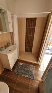 Phòng tắm tại Jánk Apartman +7 ảnh