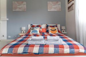 Кровать или кровати в номере Le petit loft