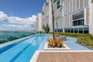 Foto sihtkohas Salvador asuva majutusasutuse Aconchegante apartamento em Cloc Marina Residence galeriist +23 fotot