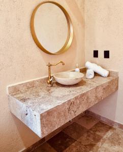 Phòng tắm tại Suites Piamonte