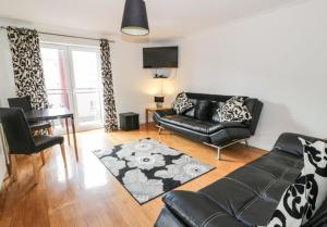 Posezení v ubytování Ayr Holiday Apartment Donnini Court