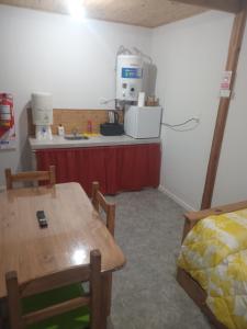 Η κουζίνα ή μικρή κουζίνα στο Cabañas Emilia