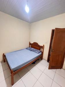 Postel nebo postele na pokoji v ubytování Casa Rural em Curuçá