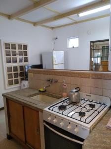 Η κουζίνα ή μικρή κουζίνα στο Casa a una cuadra de la playa