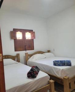 Ένα ή περισσότερα κρεβάτια σε δωμάτιο στο Casa San Diego