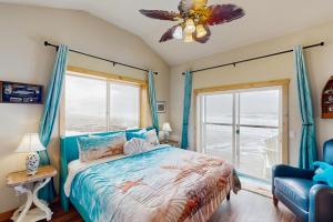 Ένα ή περισσότερα κρεβάτια σε δωμάτιο στο Sunset Beach House