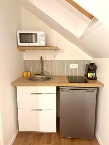 Η κουζίνα ή μικρή κουζίνα στο Dalikyda - Le Petit Coty - Downtown - Wifi