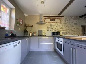 Kuchyň nebo kuchyňský kout v ubytování Maison Narbay 2 p