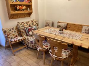 Posezení v ubytování Appartamento Le Marmotte - Auronzo