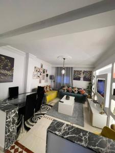 TV a/nebo společenská místnost v ubytování Appartement cosy World Rabat